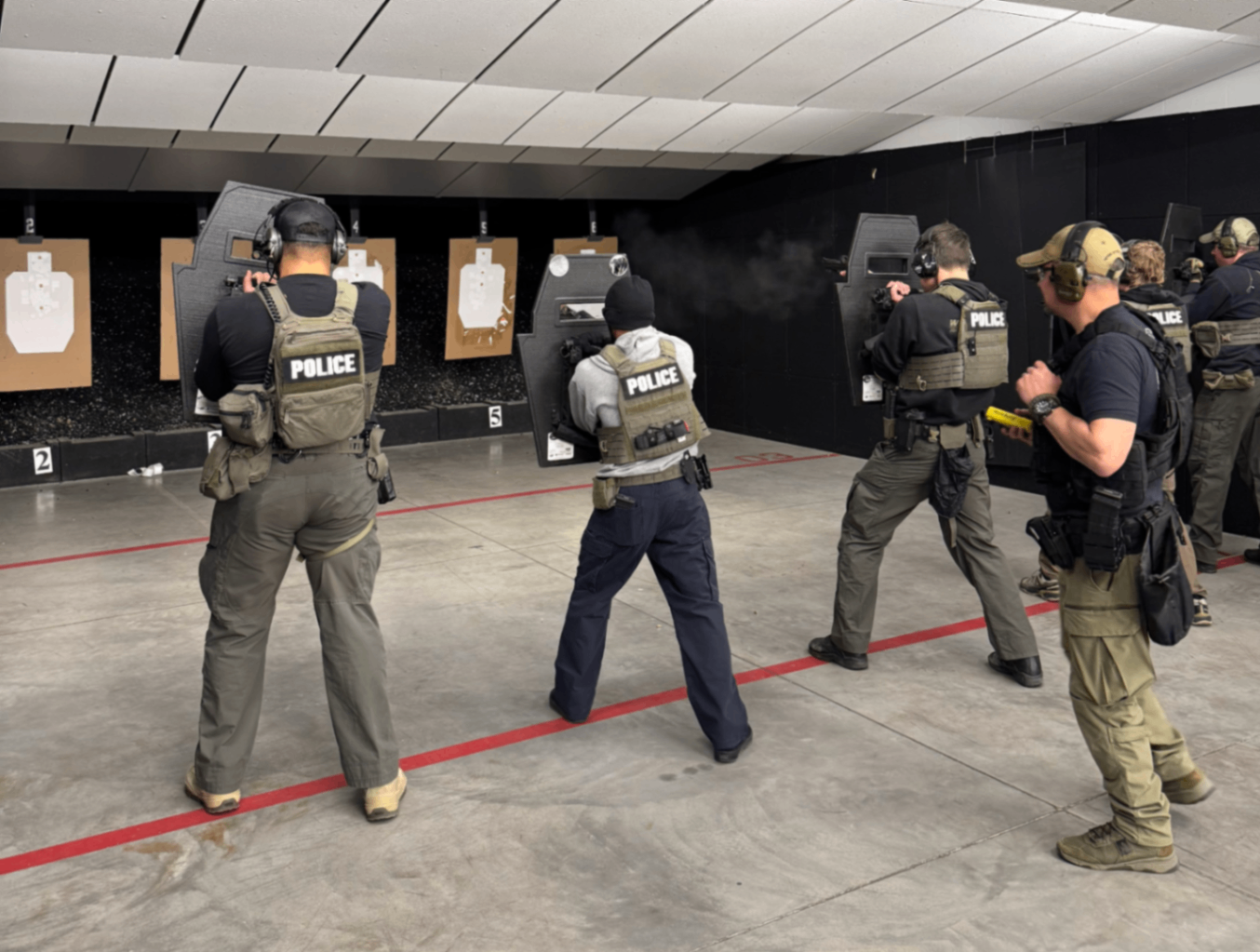 Law enforcement ballistic shield drill — indoor range